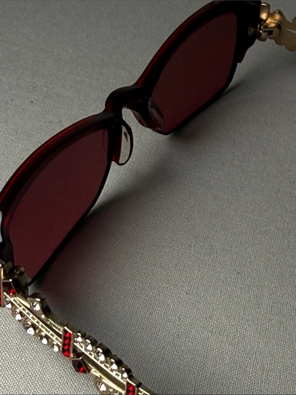Judith Leiber Red Rectangular Frames with Decorative Metal Temples